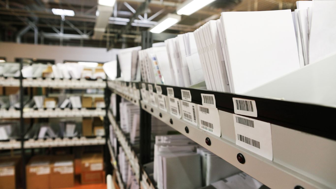 blue and red building under gray sky